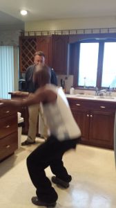 Former world champion Willy Wise performing physical therapy exercises in his home. As he gains strength, he will transition to out patient therapy.