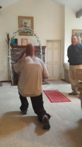 Former world champion Willy Wise performing physical therapy exercises in his home. As he gains strength, he will transition to out patient therapy.